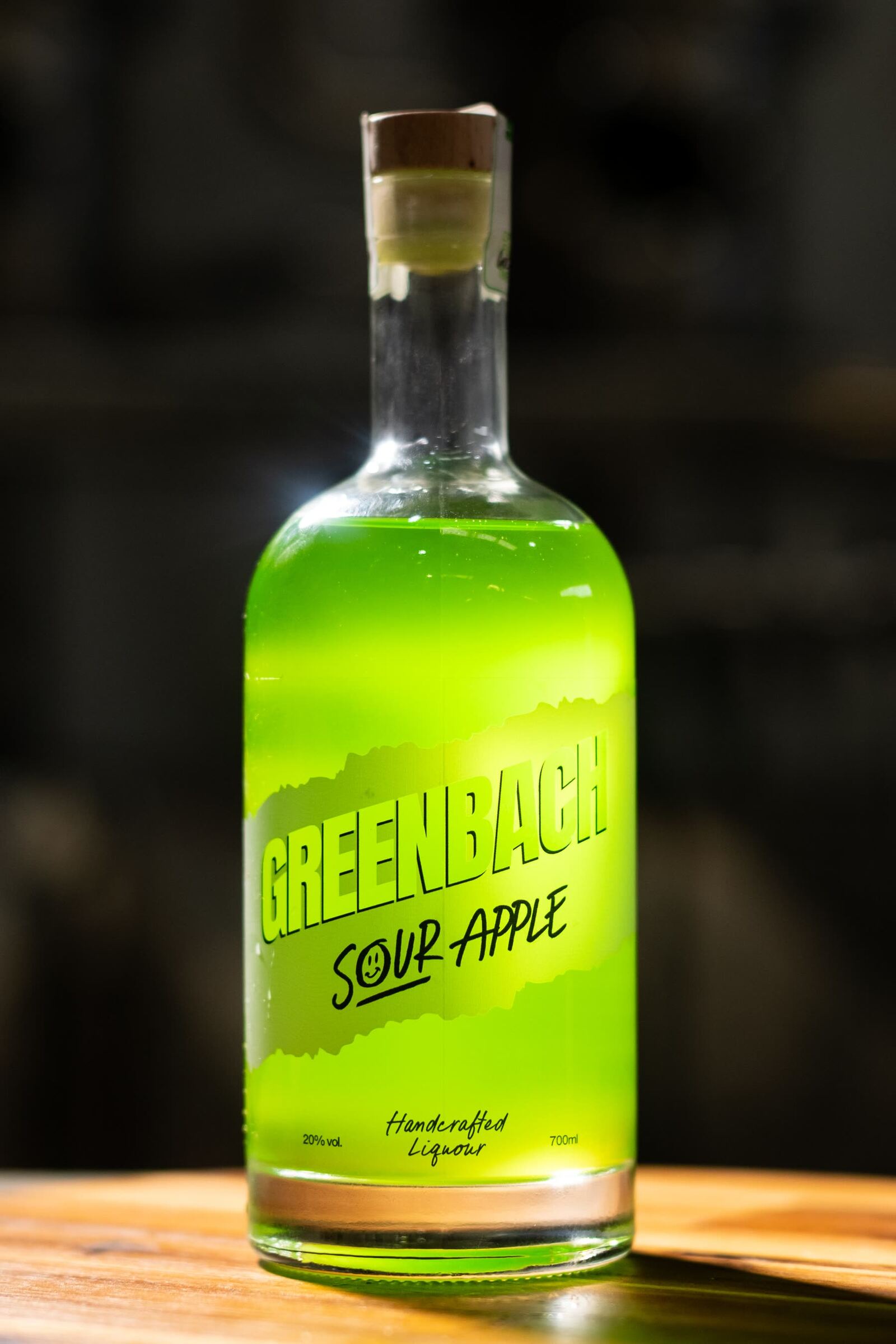 A bottle of Greenbach sour apple liqueur